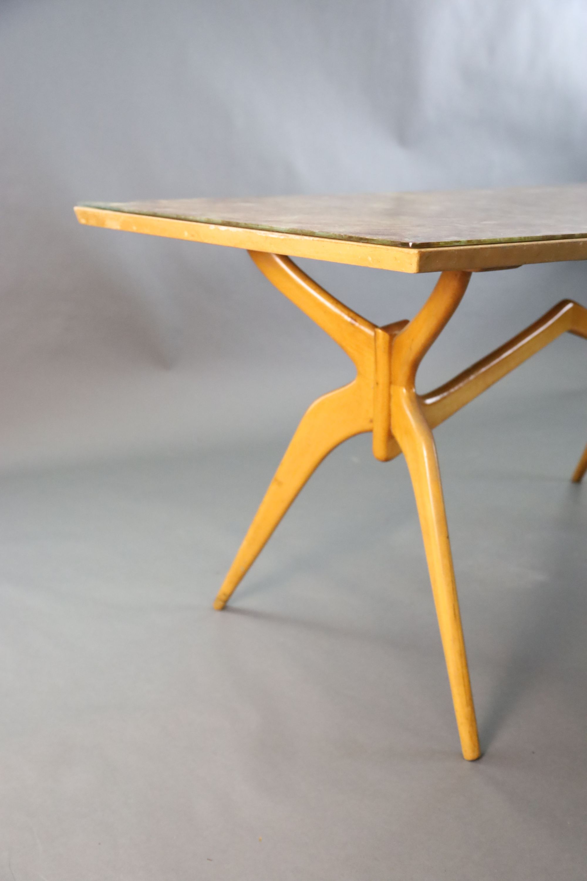A Carlo Graffi and Franco Compo glass topped beech dining table,